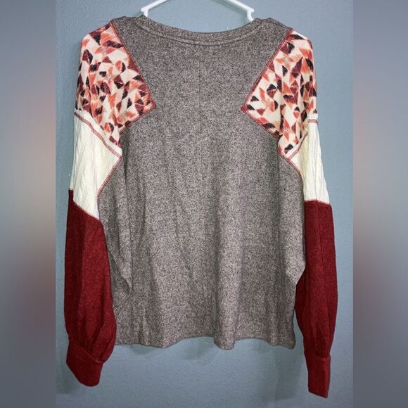 Maurice’s Gray Sweater with Red and Cream Patchwork Geometric Patterned Sleeves - Picture 2 of 2